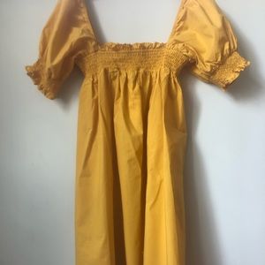 Mustard smocked UO dress NWT